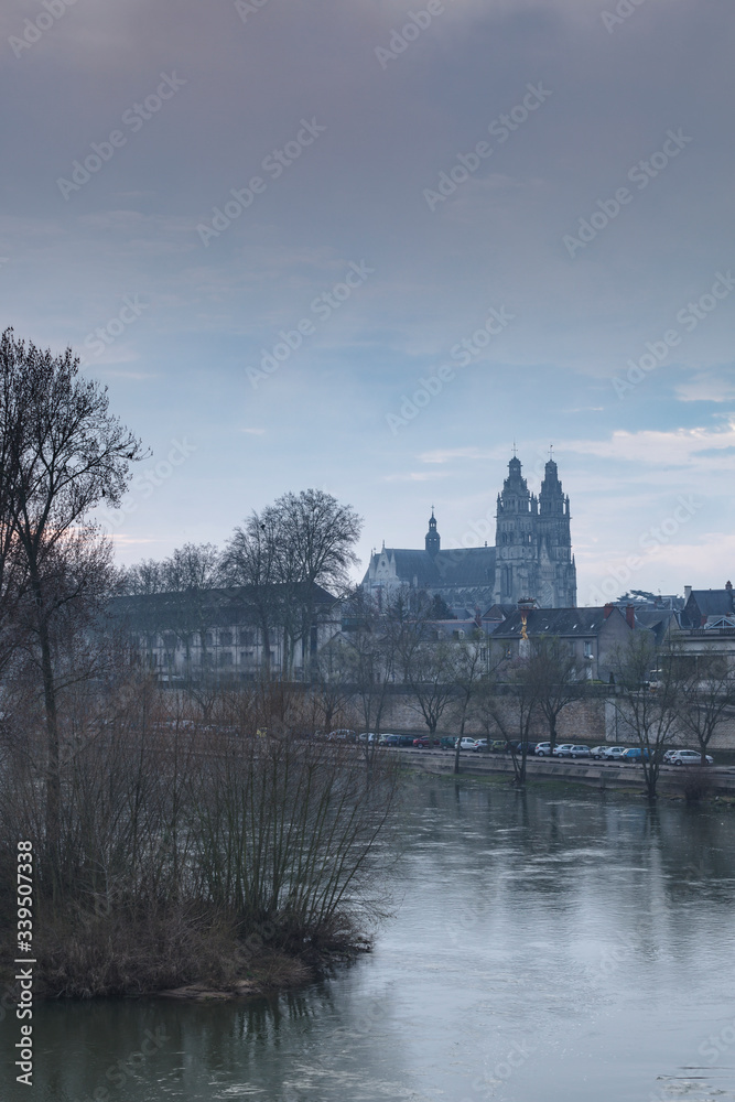 Saint Gatien cathedral and the river Loire in central France.