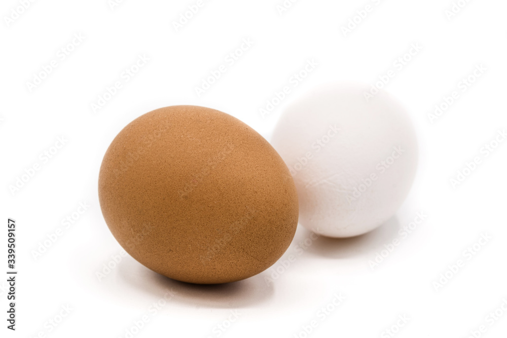 Brown and white eggs isolated on white background Brown and white eggs isolated on white background