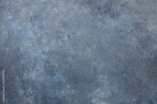 Rust and oxidized metal background. Old metal iron panel. Vintage abstract background with dim gray, dark gray, brown colors and space for text or image. Old distressed blue grungy wall background