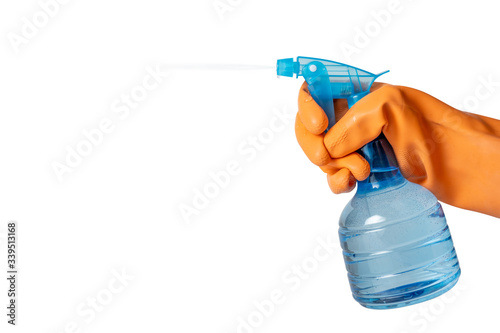 Plastic foggy sprayer bottle in hand isolated on white background.