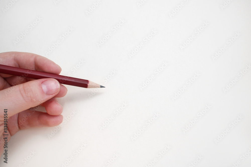 Notebook and simple pencils on a white background Notebook and simple pencils on a white background