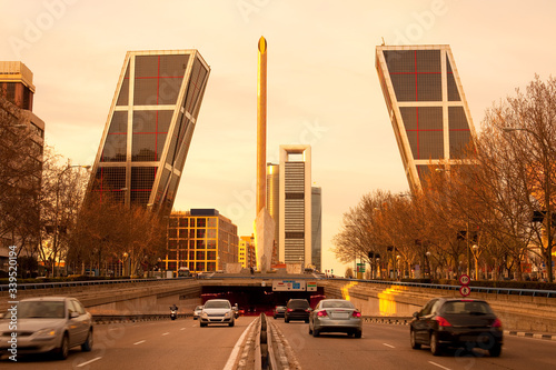 Skyline of modern buildings at Avenue Paseo de la Castellana, Madrid, Spain photo