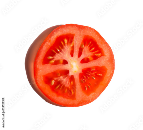 a slice of red tomato isolated on a white background with a shadow