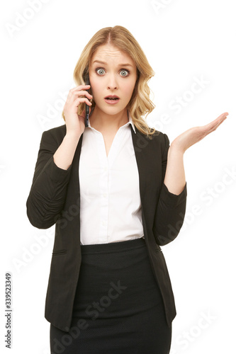 Surprised businesswoman is calling
