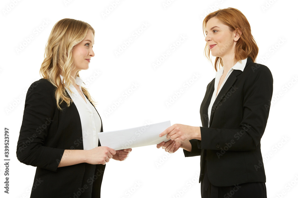 Agreement between two beautiful businesswomen. Paper, contract. Agreement between two beautiful businesswomen. Paper, contract.