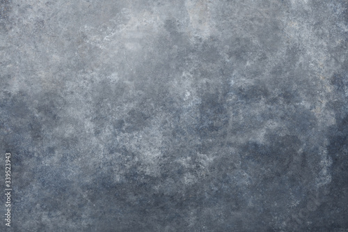 Oxidized metal background. Old metal iron panel. Vintage abstract background like a stone with dim gray, dark gray colors. Old distressed gray and blue grungy wall background