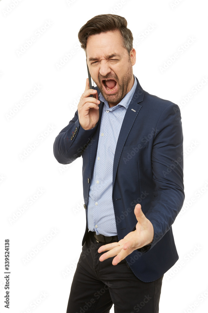 Calling businessman. He is angry at someone. Calling businessman. He is angry at someone.