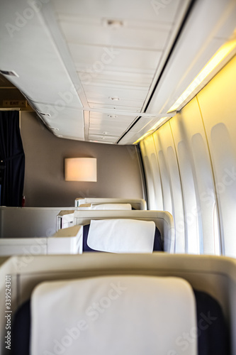 Interior view of Empty Airplane seats on board a jet liner © Sunshine Seeds