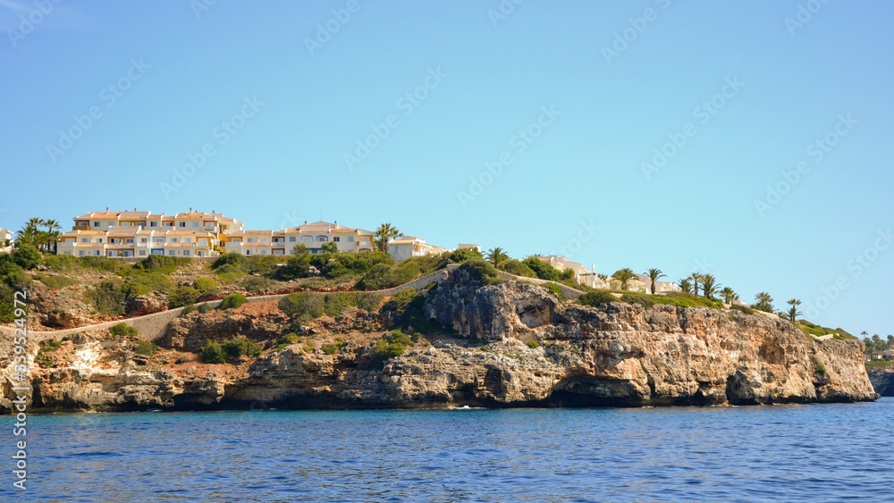 Beautiful coast of Mallorca/Majorca - Majorca coastline with caves in the rocks - view from the cruise ship, from the sea