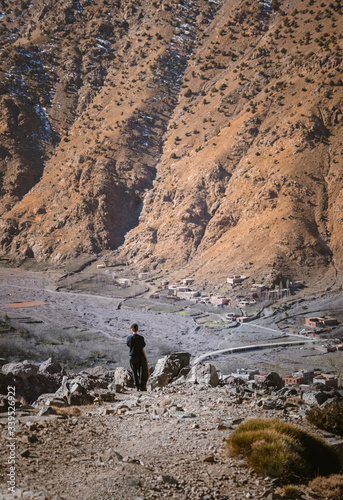 Young tourist hiking in the mountains of Morocco