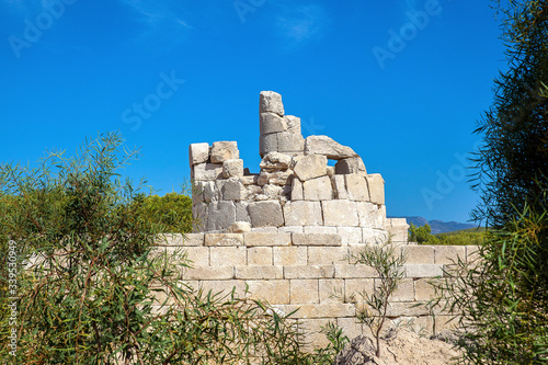 The lighthouse in Patara ancient city built by the Roman Emperor Neron, Antalya, Turkey. photo