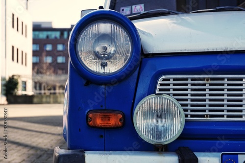 Obraz na płótnie close up of a blue trabant built in the German Democratic Republic oldtimer car w salonie