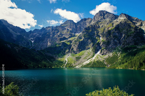 Fototapeta Naklejka Na Ścianę i Meble -  July 21, 2019. Mountain landscape with beautiful mirror lake and mountain range.