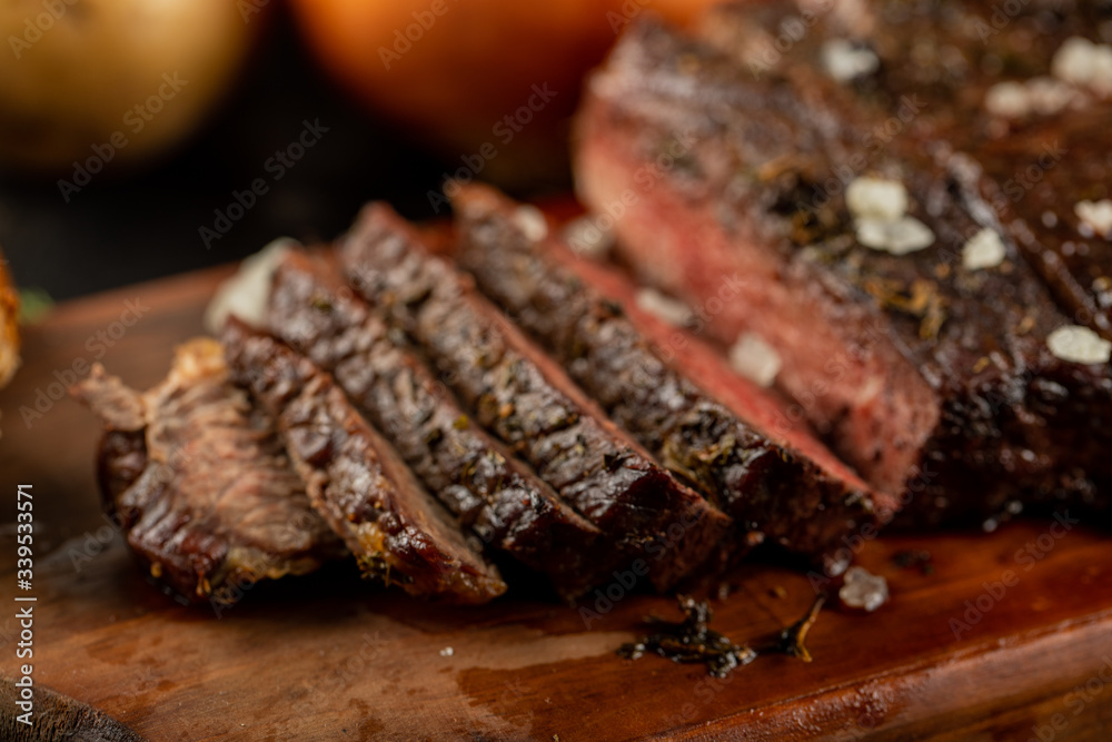 Sliced meat barbecue served with sea salt Sliced meat barbecue served with sea salt