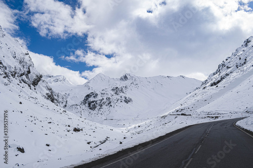 mountains just snowed with road