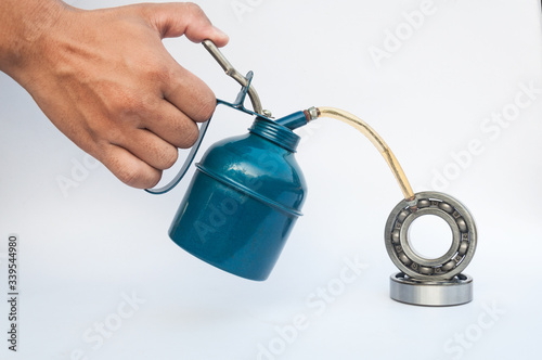 Oiler handle and ball bearings
isolated on a white background