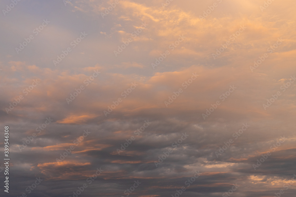 Layered clouds on the sky at sunset time.