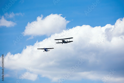 old military aircraft fly at air show