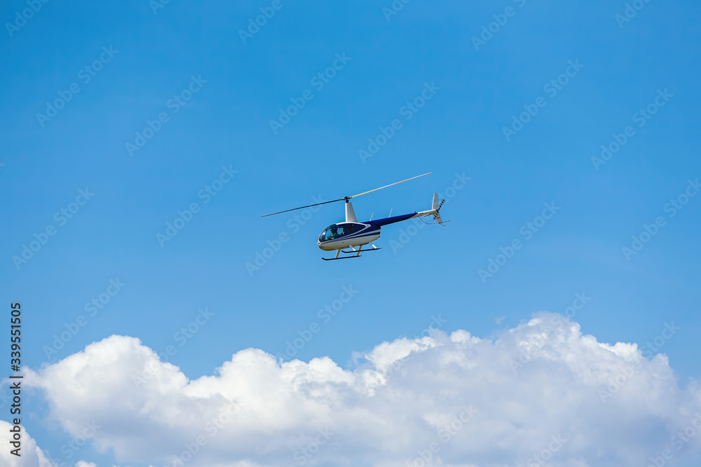 passenger helicopter flies at an air show