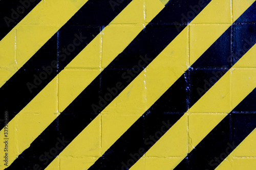 Wallpaper Mural Black and yellow lines on wall. Danger sign Torontodigital.ca