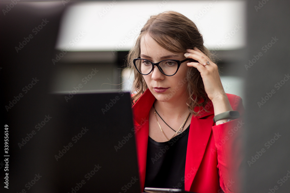 Young business woman working from home on her balcony Young business woman working from home on her balcony