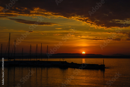Beautiful view of the yacht marina in the sea at sunrise. Greece, Peloponnese © Natalia