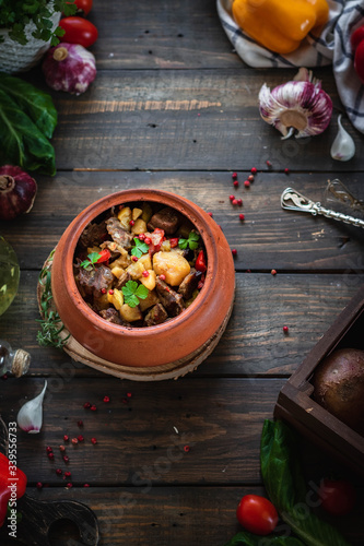 Roast in a clay pot. Braised beef with vegetables. A dish of Georgian cuisine. Chanahi