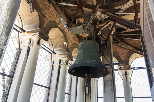 The large bell hangs on a bell tower of the Campanile di San Marco in Verona, Italy