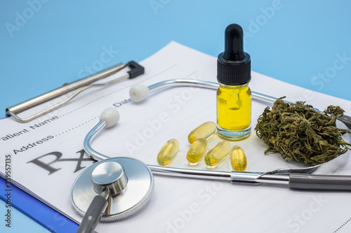 Hemp oil is put on the doctor's prescription stethoscope. Concepts of alternative medicine, herbal remedies Medical marijuana research