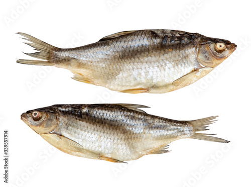 two dried fish lie in opposite directions on a white background for your design or beer bar menu