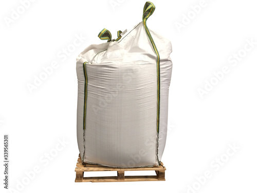 Stock Chemical fertilizer Urea jumbo-bag in warehouse waiting for shipment.Put on wooden pallets on the White Background
