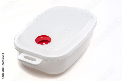 Plastic container on white background