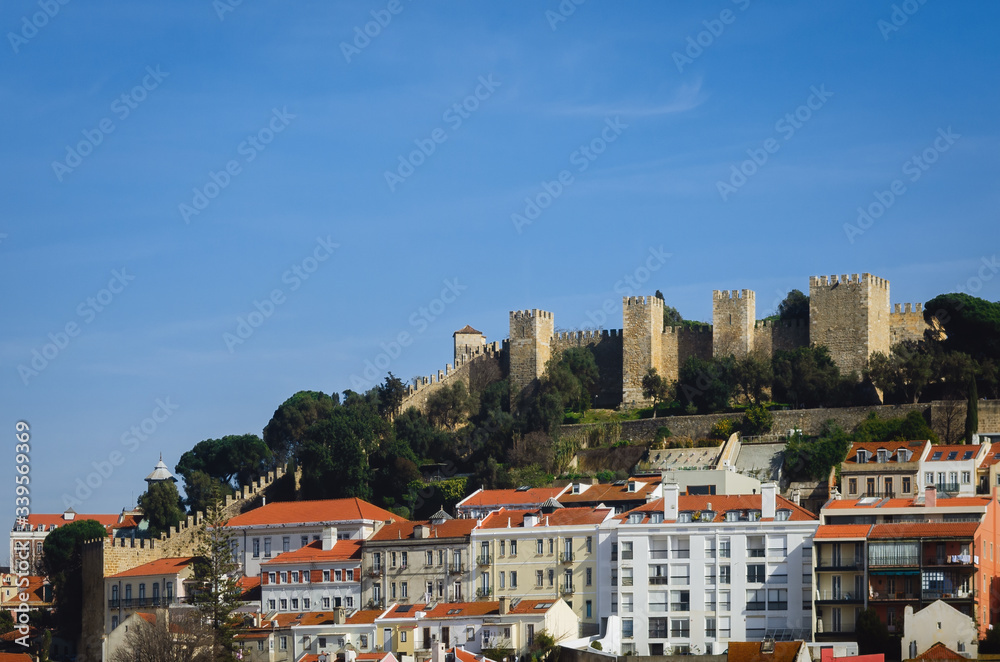 View of the Sao Jorge castle, Landmark of Lisbon, Porgugal, with clear blue sky in background