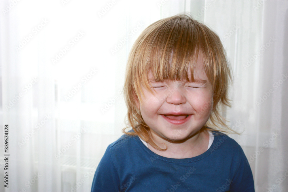 Girl smiles with her eyes closed Girl smiles with her eyes closed