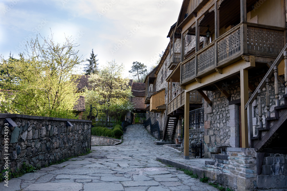 Popular tourist street in Dilijan, stylized as an old city, Armenia Popular tourist street in Dilijan, stylized as an old city, Armenia