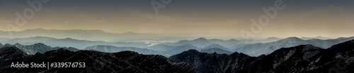 Magic landscape of mountains with fog and clouds in central system  Spain  Europe