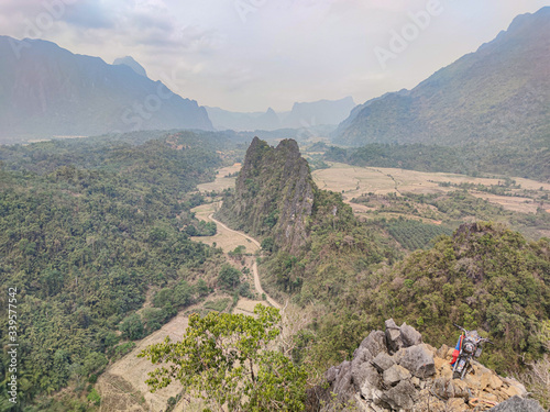 View of the green forest and rocks in the mountains.