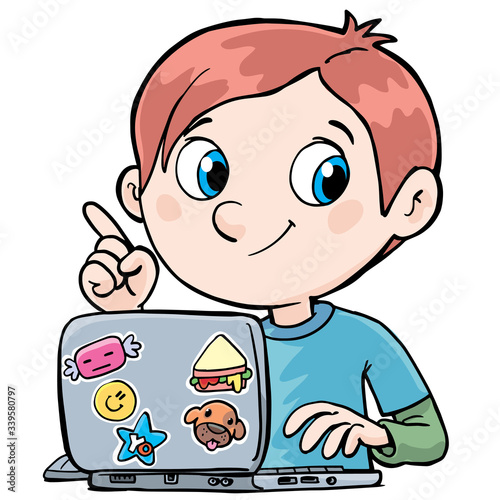 boy sits in front of the laptop and teaches distance learning