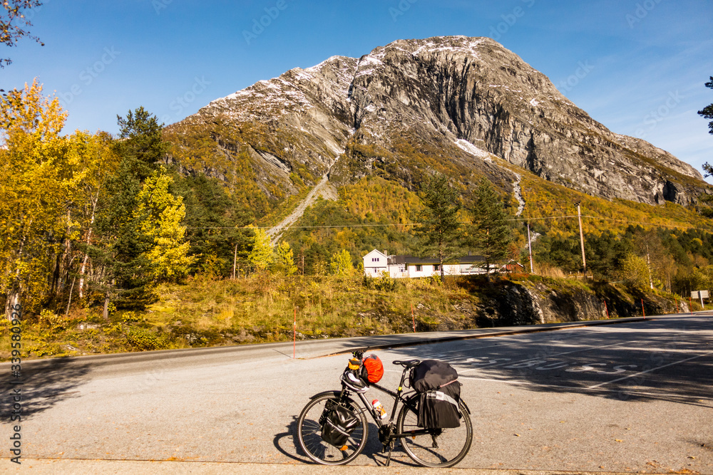 Fototapeta premium Expedition bike parked, mountains in the background