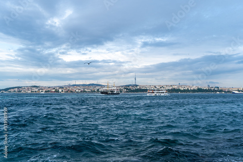 Ferries crossing The Bosphorus Strait in Istanbul, Turkey. July, 2019
