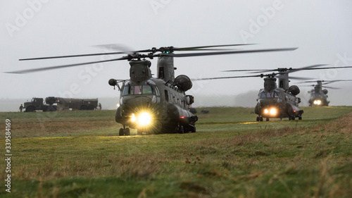 RAF Chinook helicopter on a training mission during Exercise Wessex Storm on Salisbury Plain Training Area, Wiltshire, UK photo