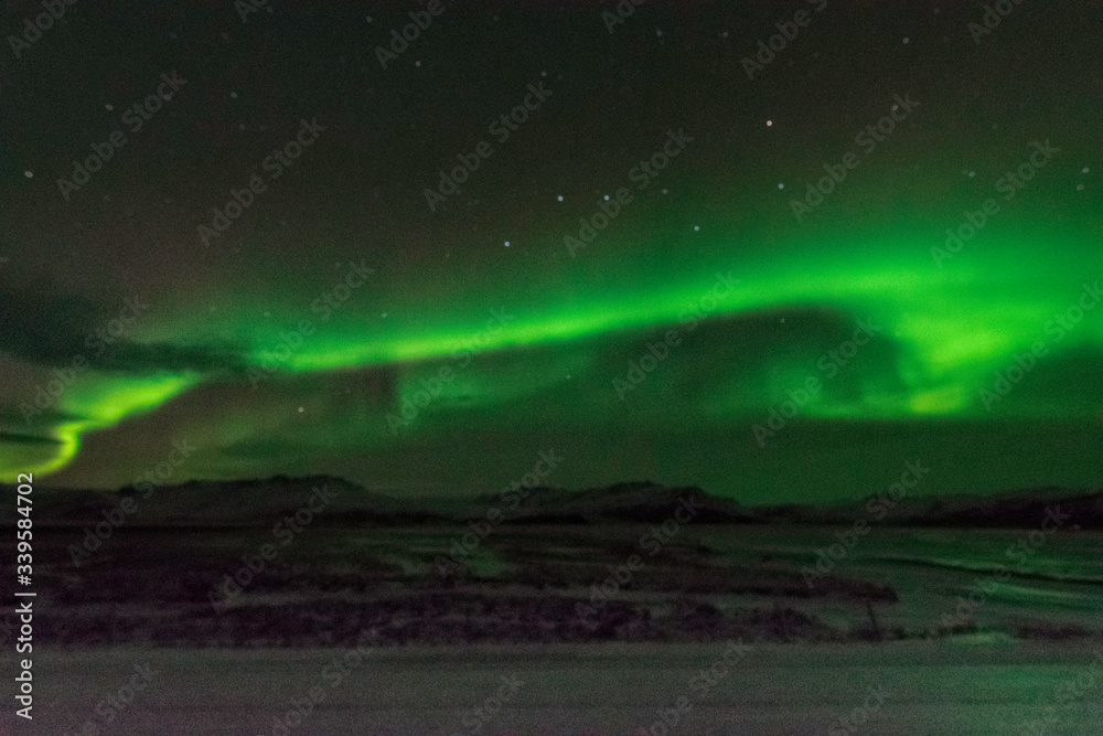 Northern Lights Aurora Borealis during Icelandic winter