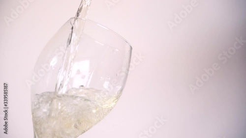 Pouring White Wine In Slow Motion