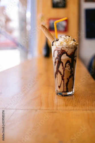 A delicious mocha frappe on a table at a restaurant photo