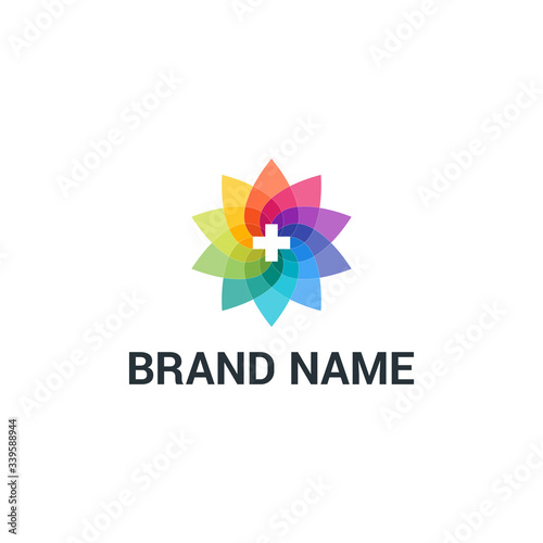 medical logo with cross and overlay design