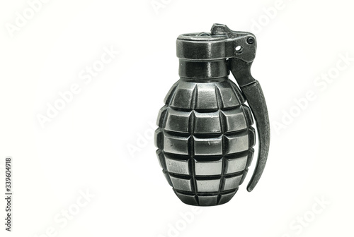 Obraz na plátně Single silver metal grenade - lighter isolated on white background with shadow a
