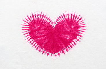 heart shape tie dye pattern hand dyed on cotton fabric abstract texture background.