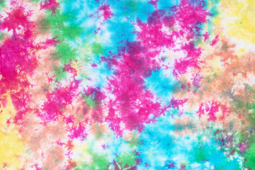 tie dye pattern hand dyed on cotton fabric abstract texture background.