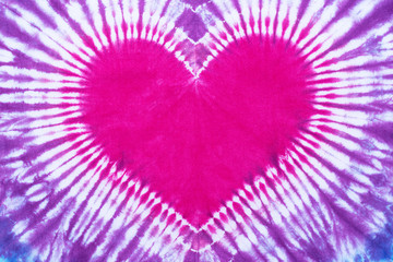 heart shape tie dye pattern hand dyed on cotton fabric abstract texture background.