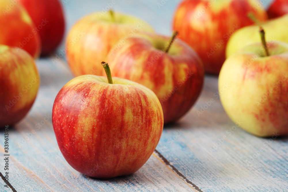 Several ripe red apples on the wooden table Several ripe red apples on the wooden table